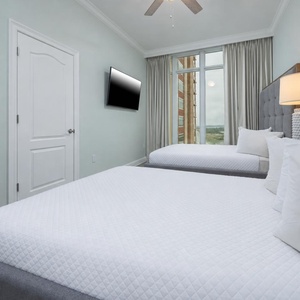 Unwind in this queen guest suite and stream your favorite shows or enjoy a good movie after a beach day