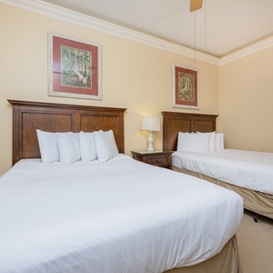 Relax on one of the cozy queen beds in this guest suite and enjoy a peaceful slumber
