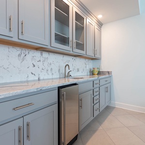 Grab a chilled drink from the fridge or create your favorite cocktail at the wet bar