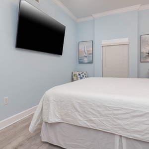 Unwind in this cozy king guest suite and stream your favorite shows after a beach day