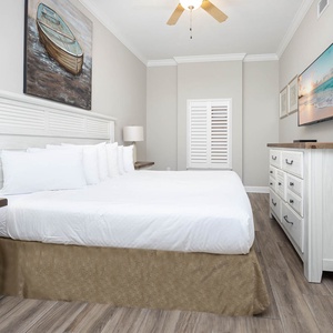 Relax on the cozy king bed in this guest suite and stream your favorite shows after a beach day