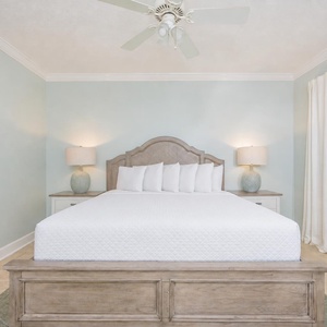 Relax in the king master suite with soft lamps glowing as you prepare for a restful night
