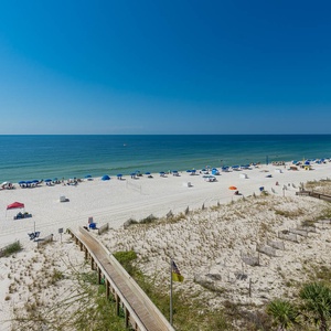 Enjoy the expansive views of the shoreline and inviting waters from your comfortable balcony seating