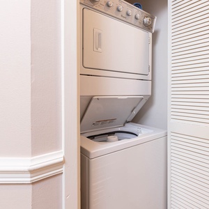 Conveniently access a stacked washer and dryer for easy laundry during your stay in this rental unit