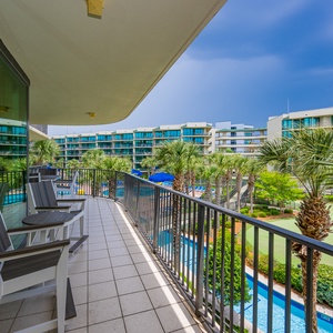 Relax on the balcony, watching the palms sway in the gentle breeze and yellow floats dot the lazy river