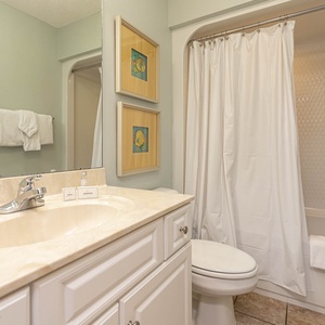 Refresh in this guest bathroom, where soft towels await you after a revitalizing shower