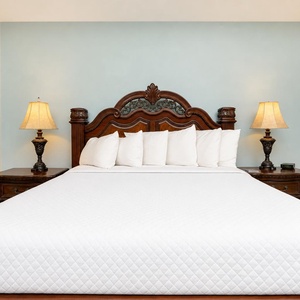 Relax in this king master suite, surrounded by soft pillows and soothing decor, inviting restful nights on your getaway