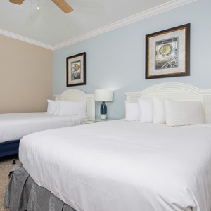 Relax in this queen guest suite surrounded by charming decor, creating a cozy vibe for restful nights