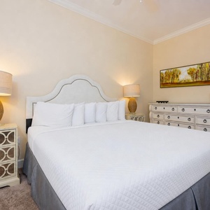 Experience peaceful nights in this king guest suite, surrounded by soft lighting and serene decor for restful relaxation