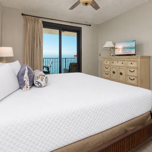 Enjoy a restful slumber in the king master suite, ready to awaken to sweeping coastal views from your balcony