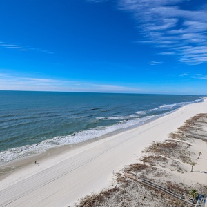 Take in the expansive views and gentle waves from your beachfront balcony, perfect for relaxation and enjoyment