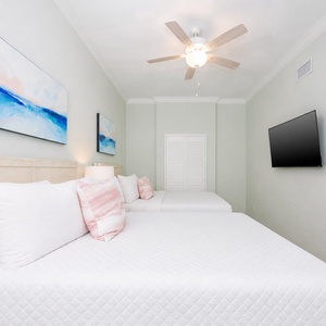 Unwind in this queen guest suite and stream your favorite shows or enjoy a good movie after a beach day
