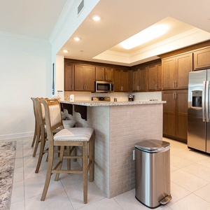 Perch on a bar stool at the granite counter and brew coffee for the perfect morning brew to start your beach day