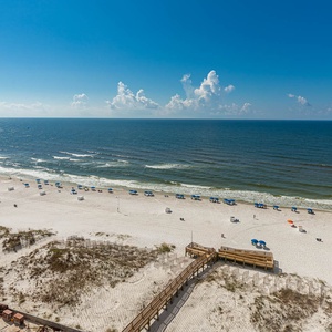 Imagine strolling the wooden boardwalk to the beachfront, feeling gulf breezes and watching waves roll in