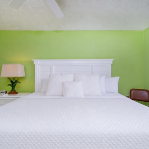 Wake refreshed for your beach adventures in the master suite with a cozy king bed and stunning views
