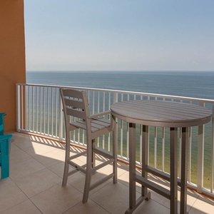 Unwind in turquoise Adirondack chairs on the balcony and listen to waves rolling along the gulf