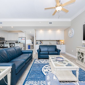 Relax on the plush couch, sharing stories and laughter as you enjoy the coastal charm of your inviting living area