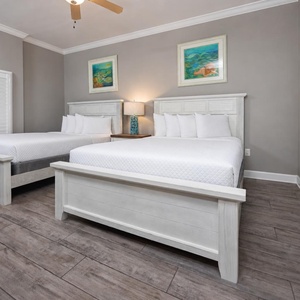 Experience restful nights in this queen guest suite, surrounded by calming decor and inviting natural light
