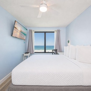 Enjoy mesmerizing coastal views through the large window in the king master suite