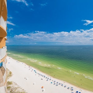 Watch the coastline stretch into the distance and the horizon meet the sky from your balcony while you soak up the sun