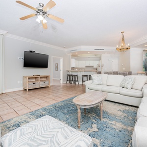 Stream your favorite shows or just enjoy great company in this living space with a coastal vibe