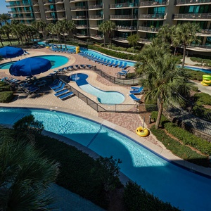 Soak up the sun and relax with views of the pool, marina, and bay activities from your balcony