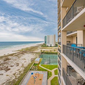 Enjoy the fresh air from your balcony, overlooking the beach and playful splash park below