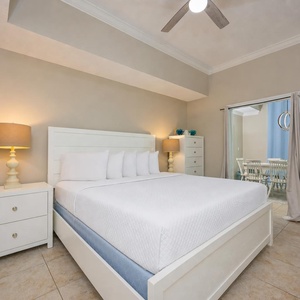 Relax in the king master suite, with natural light streaming in from the dining area