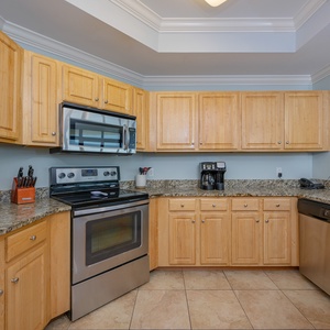 Prepare your favorite coastal-inspired dishes in this inviting kitchen, designed for memorable family moments together