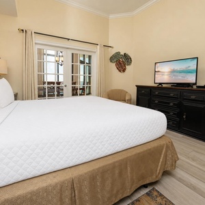 Relax in your king master suite, enjoying the comforts of a cozy bed as you catch up on your favorite shows