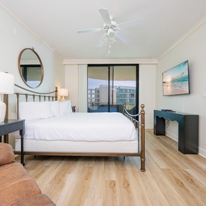 Unwind after a fun vacation day and stream your favorite shows in the king master suite with balcony access