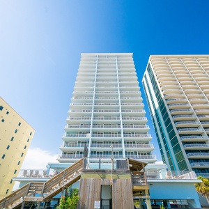 Experience direct beach access with stunning views and endless fun on the sandy shores from this welcoming rental property