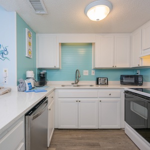 Embrace the coastal vibe while crafting your favorite meals in this charming kitchen