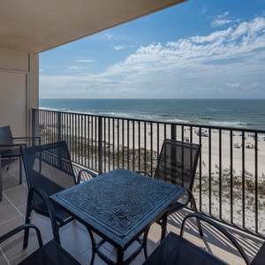 Savor your morning coffee at the outdoor table while enjoying the breathtaking views of the coastline