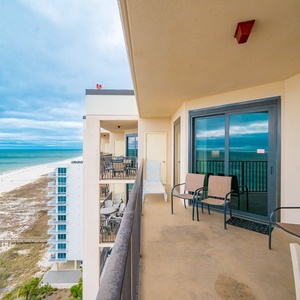 Lounge on your balcony, soaking in the stunning coastal views and relishing the serene vibe of beach life below