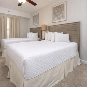 Relax on one of the cozy double beds in this guest suite and enjoy a peaceful slumber