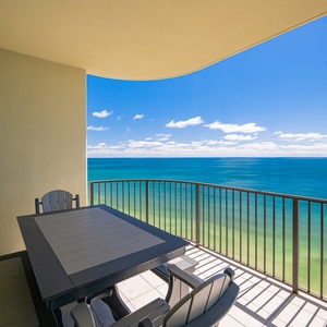 Bask in the coastal vibe from your balcony table, soaking in views and the gentle sounds of the beach below