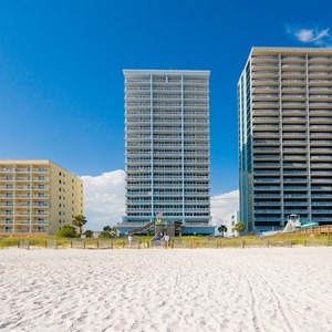 Step out to the beach from The Colonnades in Gulf Shores, where stunning views and easy access to the shore await you