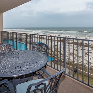 Savor meals at the outdoor dining table while enjoying refreshing breezes and views of the coastline