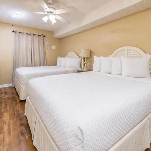 Two queen beds in the guest suite invite you to unwind after a day of adventure with your family