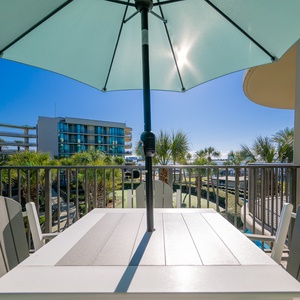 Bask in the gentle breeze from the balcony while soaking in bay views and the shimmering pool below