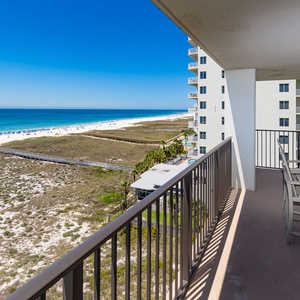 Gentle coastal breeze and distant chatter create a relaxing backdrop for your balcony retreat with coastal views