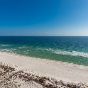 Breathtaking views of the shoreline and gentle waves from your beachfront balcony