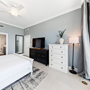 Pull back the curtains by the dresser to listen to waves and watch the gulf from the master suite balcony