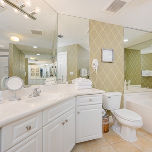 Refresh in the master bath after a day of adventure with a soothing jetted tub and relaxing walk-in shower