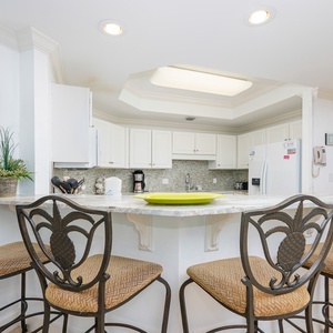 Sip your morning coffee at the breakfast bar and get ready for a day of adventure in this stylish space