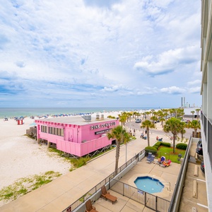 Savor the view from the balcony with seating, perfect for enjoying the sun and fresh air during your stay