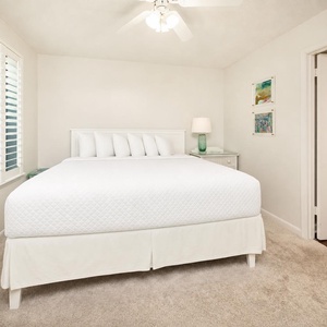 Drift into serene relaxation in this king guest suite, where soft bedding invites restful nights and rejuvenating mornings