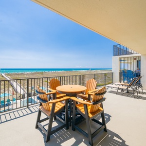 Savor relaxing moments with loved ones on your balcony, enjoying refreshing coastal views and vibrant beach vibes