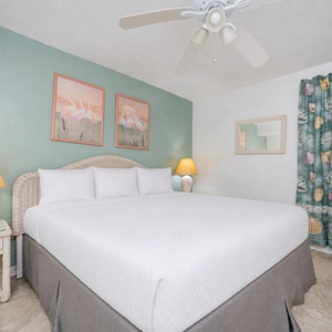 Soft tile coolness meets plush king bed linens in your serene master suite perfect for restful nights